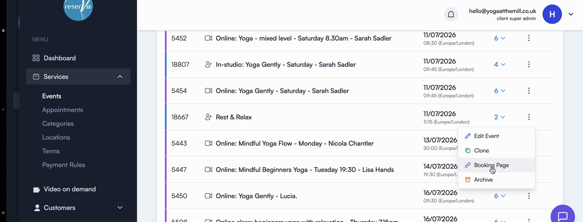 The events list with an event's action menu open, showing the Booking Page option