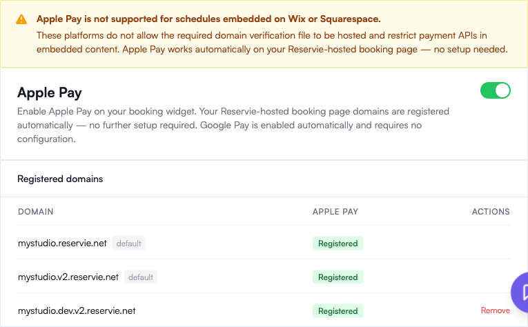 Top of the Settings Apple Pay tab: the platform-support warning banner, the Apple Pay enable toggle, and a Registered domains table listing the studio's default and custom domains as Registered